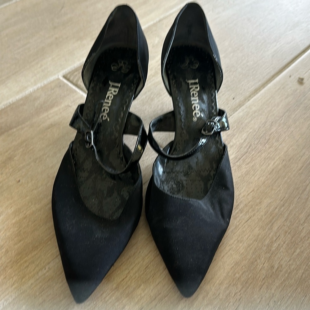 black fabric spike heel shoes